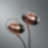 Sleek metallic outer ear earbuds